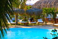 The pool stretches right across the whole hotel. Swim from your room right to the bar.
